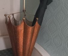 Copper and brass umbrella stand.