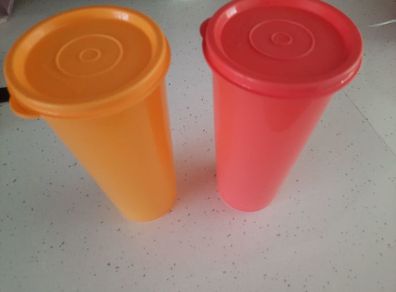 two tupperware jumbo Tumblers