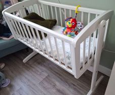 White Mother Care Swinging Crib
