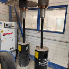 Commercial-grade patio heater suitable for outdoor commercial or residential use. Operates on propane or natural gas. Portable design with stable base. High heat output