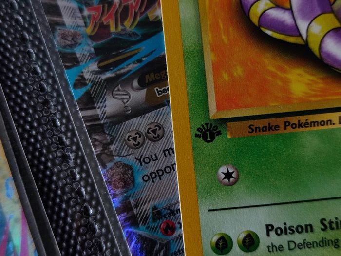 Ekans ! FIRST EDITION ! Rare Near Mint- Mint Condition ! from Team Rocket Set ! 2000 ! Pokemon Card !