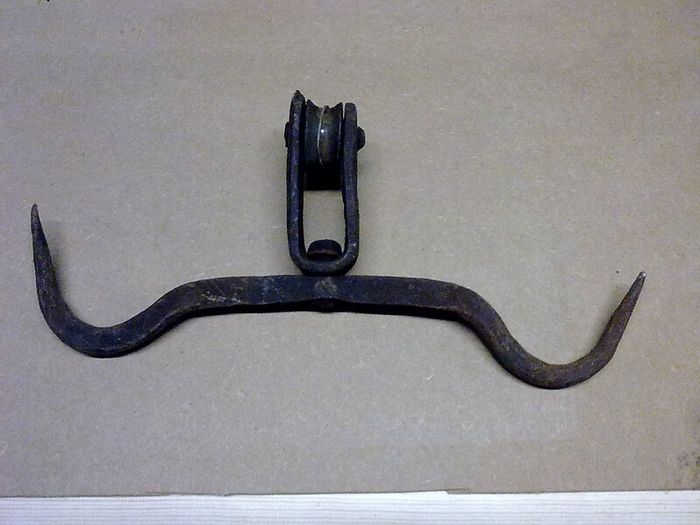 Old Irish blacksmith made hook with pulley