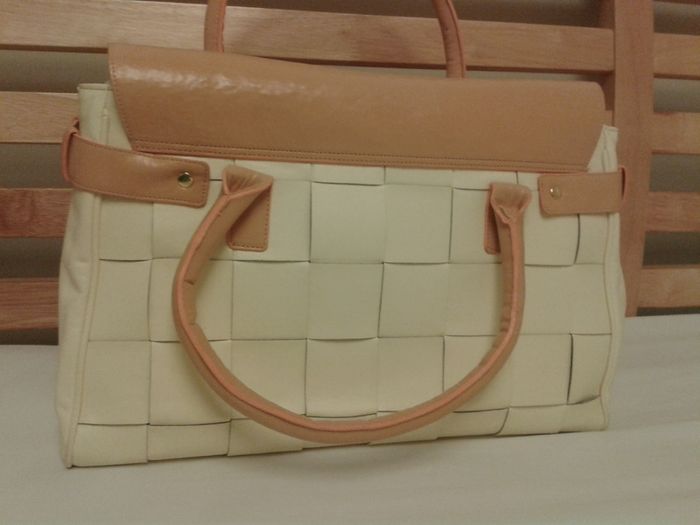 cream woman hand bag