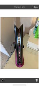 Dyson corrale black/purple in excellent condition. No offers below asking price.
