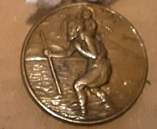 yellow metal st Christopher  (2) I'm a Catholic