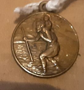 yellow metal st Christopher  (2) I'm a Catholic
