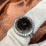 A beautiful silver ring with smokey quartz and white topaz. Image 8