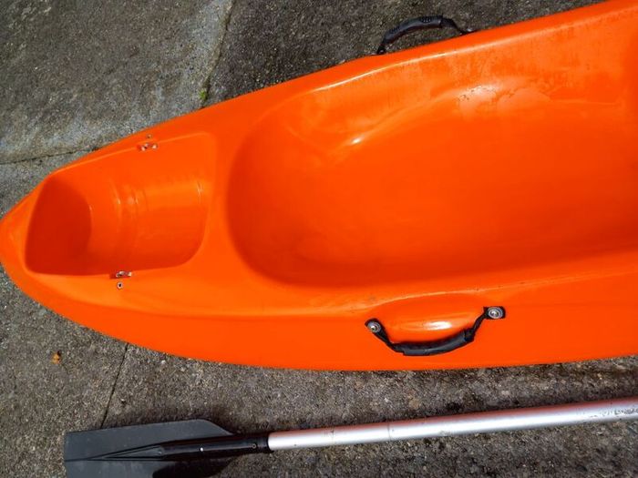 Kayak plus 2 paddles and 2 bouyancy aides