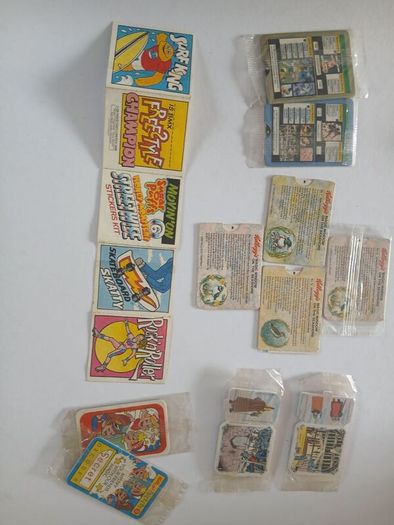 Scrace lot of 1980s retro cereal freebies . Kelloggs Rice crispies , sugar puffs stickers games and cards .