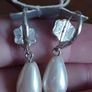 Elegant drop pearl earrings. Image 3