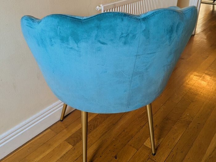 Turquoise velvet shell chair