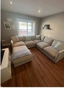 Corner sofa w/footstool