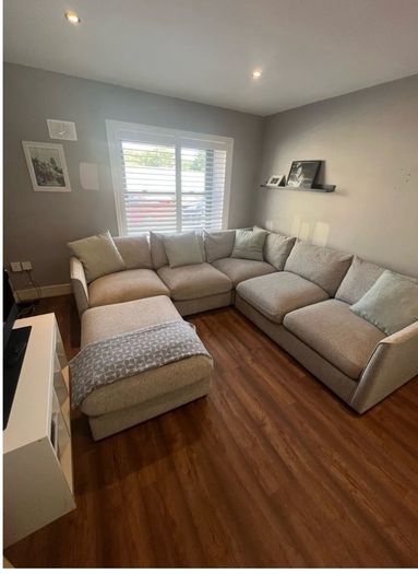 Corner sofa w/footstool