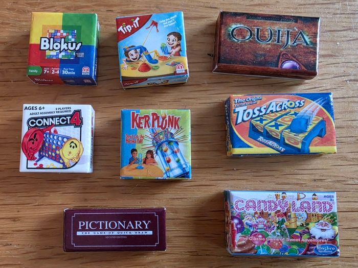 Dolls house - boardgames and boxed toys.. incl Miccro toys and mini brands
