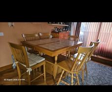 Solid oak extendable dining table with 6 chairs