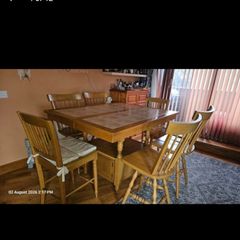Solid oak extendable dining table with 6 chairs