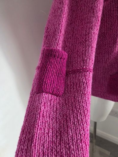 As new. Very Unusual Nua Merino Wool/Silk Mix Zipped Cardigan in Wine and Pink. Size M (8-12)