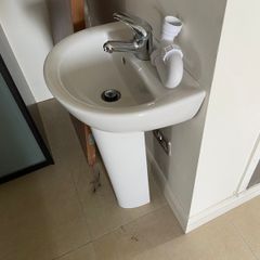 Sink and pedestal and WC with fittings.