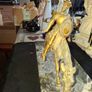 Rare Don Quixote and Sancho Panza cast in patinated bronze and mounted onto a veined marble plinth base. Don Quixote is depicted atop his gaunt horse, Rocinante, holding his shield, while his squire Sancho Panza follows Image 2