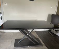 Glass top table and leather chairs