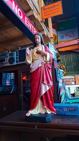 Antique holy statue and pictures
