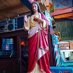 Antique holy statue and pictures