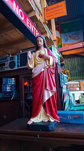 Antique holy statue and pictures