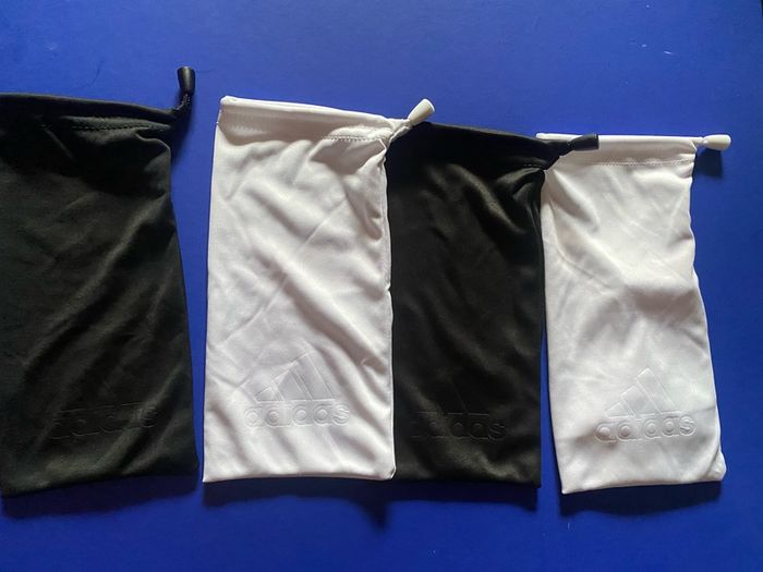 Adidas sunglasses original cover bag brand new