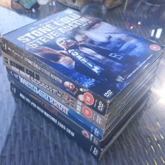 Lots of WWE wrestling DVDs, D18 post 7e, good condition