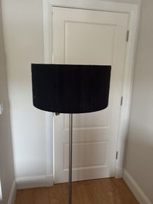 Silver floor lamp with black shade with dimmable feature