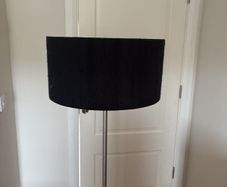 Silver floor lamp with black shade with dimmable feature