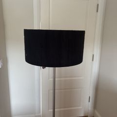 Silver floor lamp with black shade with dimmable feature