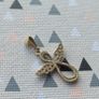 Gold pendant, stamped 375. A few stones are missing, so selling for repair. Please see photos for condition. Image 5