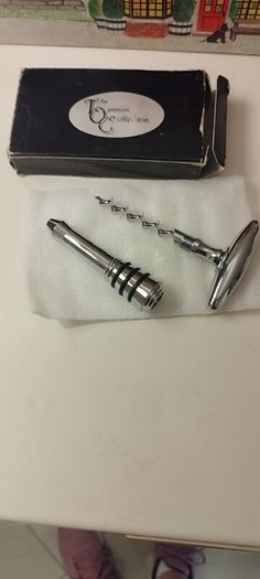 wine stopper/corkscrew