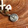 3 medals on a pin Image 3