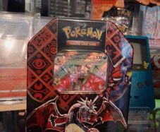Charizard Paldean Fates pokemon tin