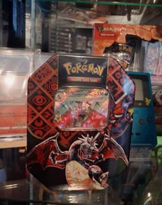 Charizard Paldean Fates pokemon tin
