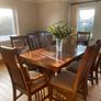 Beautiful long dark Oak Dining table and 8 chairs Image 2