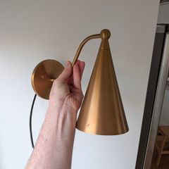 Mid century style raw brass wall sconces (x2), unused