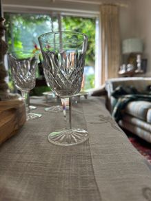 Four vintage Lismore pattern white wine glasses