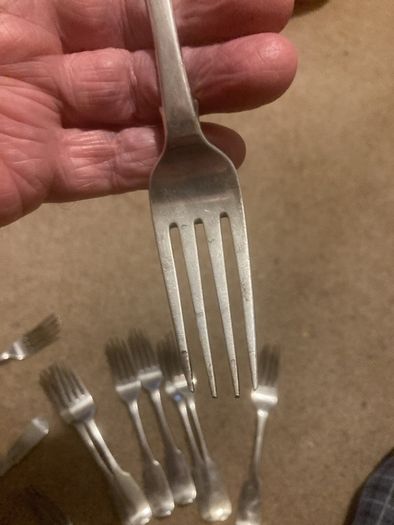 12 silver heavy forks made in Ireland around 1825 by well known Irish silversmiths.