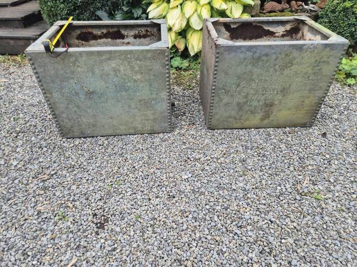Galvanised rivet vintage water tanks