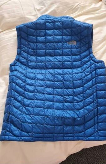 Mens gillet, blue, North Face, size US medium. Aisa L