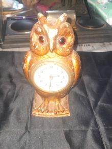Cold Painted Bronze Clock In Form Of An Owl. The Decorative Dial Sits In The Owls Belly And Has Wind Up Movement,