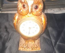 Cold Painted Bronze Clock In Form Of An Owl. The Decorative Dial Sits In The Owls Belly And Has Wind Up Movement,