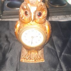Cold Painted Bronze Clock In Form Of An Owl. The Decorative Dial Sits In The Owls Belly And Has Wind Up Movement,