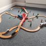 Wooden train set with 5 vehicles and turnstile Image 4