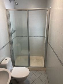 Shower door, Toilet, & Wash basin