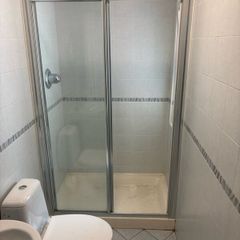 Shower door, Toilet, & Wash basin