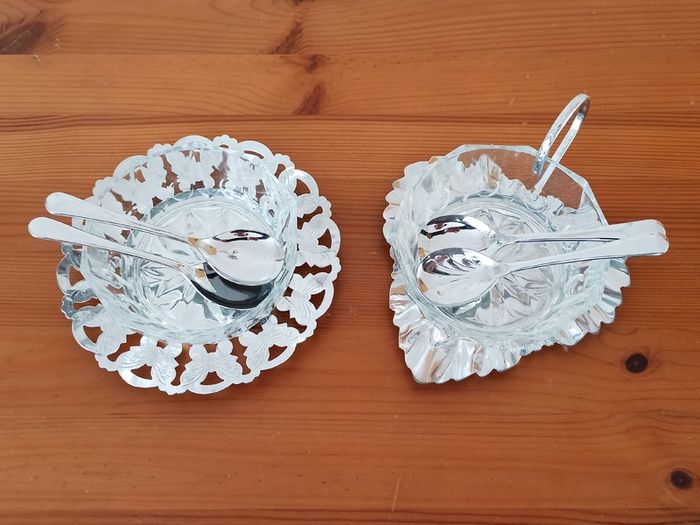 Vintage glass serving bowls sitting on chrome finish ornated frame/plates glass made in France by Reims, spoons in Sheffield